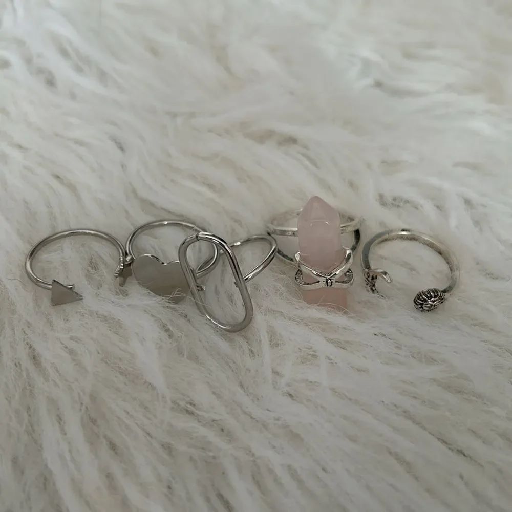 3/30$ Silver rings- size 8